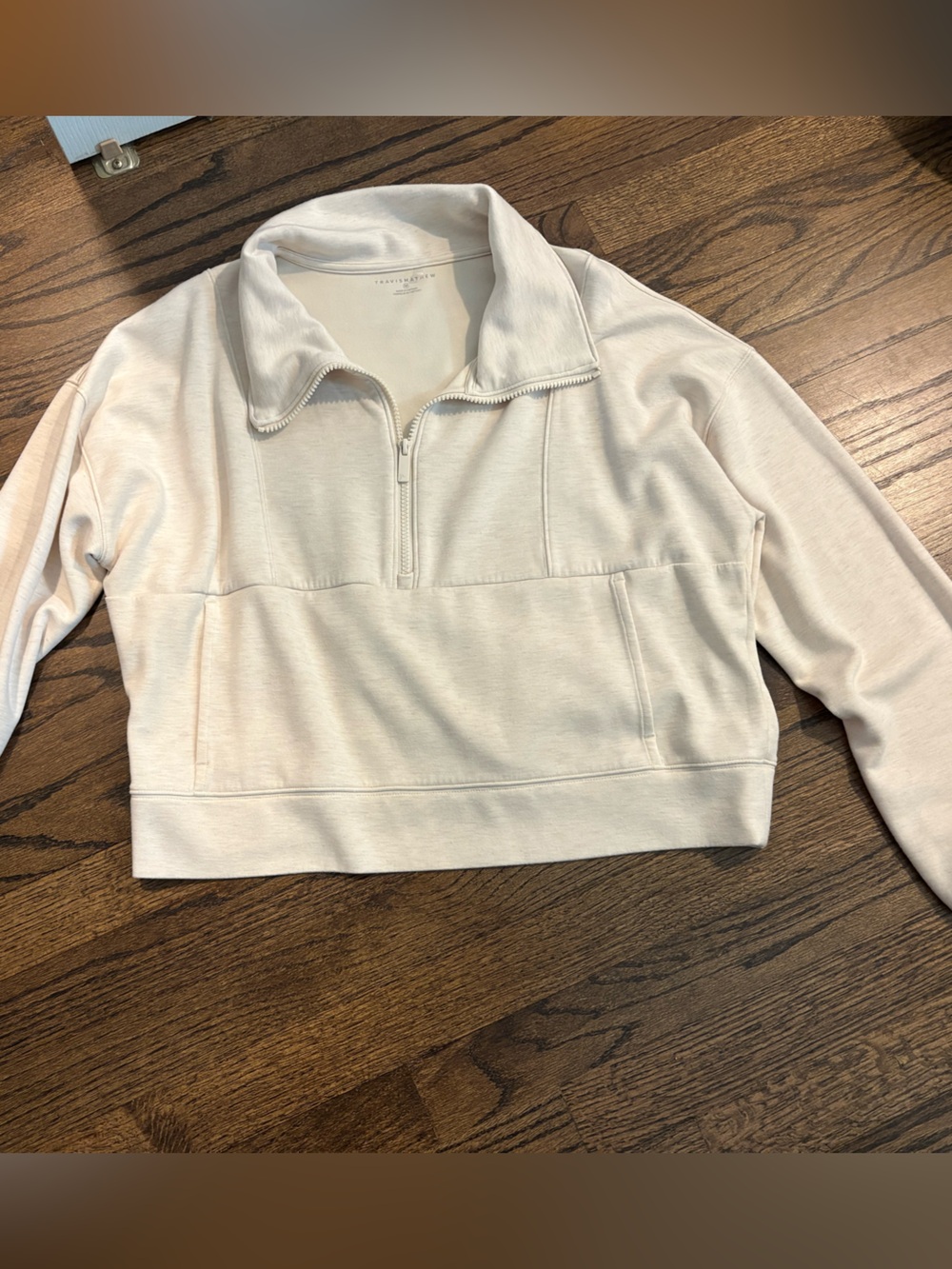 Women’s Travis Mathew Half-Zip Pullover Sweatshirt in Light Cream size Medium